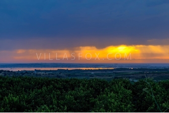 74-1200166824966511811663302225stormcloudsclearingoverSanMiguelsaltlake