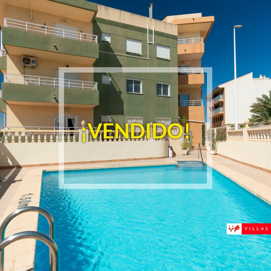 SOLD! 2-bedroom 2-bathroom apartment with private solarium, 2 garage spaces, communal pool